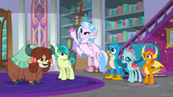 Size: 1600x898 | Tagged: safe, derpibooru import, screencap, gallus, ocellus, sandbar, silverstream, smolder, yona, changedling, changeling, classical hippogriff, dragon, earth pony, griffon, hippogriff, pony, yak, school raze, book, bookshelf, bow, cloven hooves, colored hooves, dragoness, female, hair bow, jewelry, ladder, male, monkey swings, necklace, school of friendship, spread wings, student six, wings