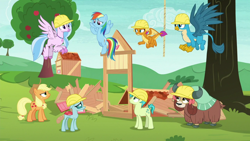 Size: 1280x720 | Tagged: safe, derpibooru import, screencap, applejack, gallus, ocellus, rainbow dash, sandbar, silverstream, smolder, yona, changedling, changeling, classical hippogriff, dragon, earth pony, griffon, hippogriff, pegasus, pony, yak, non-compete clause, bow, clothes, cloven hooves, colored hooves, flying, hair bow, hard hat, hat, jewelry, monkey swings, necklace, rope, student six, wood