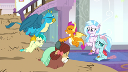 Size: 1279x719 | Tagged: safe, derpibooru import, screencap, gallus, ocellus, sandbar, silverstream, smolder, yona, changedling, changeling, classical hippogriff, dragon, earth pony, griffon, hippogriff, pony, yak, a matter of principals, bow, eyes closed, gritted teeth, hair bow, jewelry, monkey swings, necklace, quicksand, student six, teeth