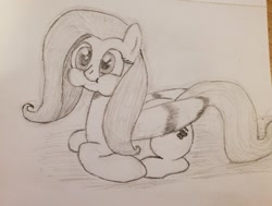 Size: 1280x968 | Tagged: safe, derpibooru import, fluttershy, pony, cute, holding breath, lying down, ponyloaf, prone, puffy cheeks, shyabetes, solo, traditional art