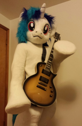 Size: 1440x2220 | Tagged: dead source, safe, artist:atalonthedeer, derpibooru import, dj pon-3, vinyl scratch, anthro, human, pony, unicorn, g4, 2015, electric guitar, fursuit, guitar, irl, irl human, looking at you, looking down, looking down at you, musical instrument, photo, ponysuit, raised hoof, raised leg, solo, strap, underhoof