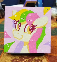 Size: 2736x2984 | Tagged: safe, artist:dandy, derpibooru import, oc, oc only, oc:worm on a string, earth pony, pony, acrylic painting, bust, commission, ears, earth pony oc, female, floppy ears, looking at you, mare, portrait, smiling, solo, toy, traditional art, worms