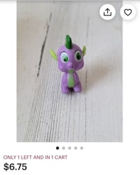 Size: 718x896 | Tagged: safe, derpibooru import, spike, dragon, bootleg, derp, dollar sign, eye, eyes, figure, irl, merchandise, money, photo, selling, small, solo, toy