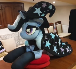 Size: 2468x2217 | Tagged: safe, artist:ponimalion, derpibooru import, trixie, pony, unicorn, altered cutie mark, bedroom eyes, brooch, cape, clothes, dyed mane, dyed tail, ear piercing, eyeshadow, female, goth, hat, horn, horn ring, irl, jewelry, lidded eyes, life size, makeup, mare, photo, piercing, pillow, plushie, ring, smiling, solo, tail, trixie's brooch, trixie's cape, trixie's hat