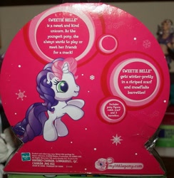 Size: 731x750 | Tagged: safe, derpibooru import, sweetie belle (g3), pony, unicorn, g3, g3.5, bipedal, box, female, filly, foal, hasbro, hasbro logo, logo, merchandise, snow, snowflake, solo, text