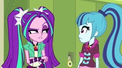 Size: 1024x576 | Tagged: safe, screencap, aria blaze, sonata dusk, equestria girls, rainbow rocks, aria blaze is not amused, duo, female, locker, pigtails, ponytail, raised eyebrow, twintails, unamused