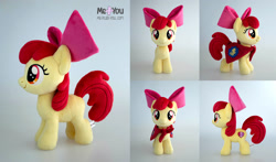 Size: 2000x1179 | Tagged: safe, artist:meplushyou, derpibooru import, apple bloom, earth pony, pony, bow, cape, clothes, cmc cape, female, filly, foal, hair bow, irl, photo, plushie, solo