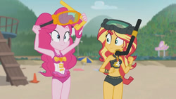 Size: 800x450 | Tagged: safe, derpibooru import, screencap, pinkie pie, sunset shimmer, human, equestria girls, g4, beach, belly, belly button, clothes, female, midriff, one-piece swimsuit, pinkie pie swimsuit, snorkel, sunset shimmer's beach shorts swimsuit, swimsuit