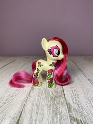 Size: 1588x2118 | Tagged: safe, derpibooru import, photographer:sweetpuppyvintage, roseluck, earth pony, pony, g4, brushable, female, irl, mare, merchandise, photo, ponymania, solo, toy