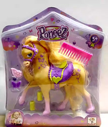 Size: 800x937 | Tagged: safe, derpibooru import, butterfly, horse, baobab (toy company), bootleg, bridle, clothes, comb, female, flower, gradient legs, irl, leg warmers, mare, photo, poneez, raised hoof, raised leg, saddle, simple background, tack, toy, white background