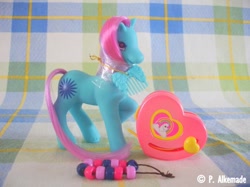 Size: 762x569 | Tagged: safe, derpibooru import, earth pony, pony, g2, bead machine, beads, comb, female, irl, mare, photo, raised hoof, raised leg, solo, springdy, tail, toy, unshorn fetlocks