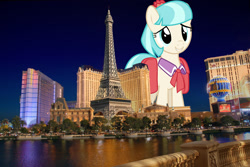 Size: 2249x1500 | Tagged: safe, artist:thatguy1945, artist:theotterpony, derpibooru import, coco pommel, earth pony, pony, bag, female, giant pony, giantess, highrise ponies, irl, las vegas, macro, mare, necktie, nevada, photo, ponies in real life, saddle bag, smiling, solo