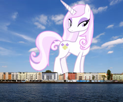 Size: 1700x1400 | Tagged: safe, artist:90sigma, derpibooru import, edit, editor:jaredking779, fleur-de-lis, pony, unicorn, berlin, female, germany, giant pony, giant unicorn, giantess, highrise ponies, irl, looking at you, macro, mare, mega giant, photo, ponies in real life, smiling, solo