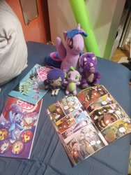 Size: 3024x4032 | Tagged: safe, artist:kuba18i, derpibooru import, spike, twilight sparkle, twilight sparkle (alicorn), alicorn, dinosaur, dragon, pony, bed, comic, irl, love live!, merchandise, meta, photo, plushie, poland, polish, ponies in real life, pony plushie, reading, sosnowiec, toujou nozomi, triceratops