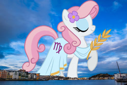 Size: 2047x1365 | Tagged: safe, derpibooru import, edit, editor:jaredking779, oc, oc only, oc:virgo, earth pony, pony, clothes, dress, eyes closed, female, flower, flower in hair, giant pony, giantess, highrise ponies, irl, kristiansund, macro, mare, norway, photo, ponies in real life, raised hoof, raised leg, smiling, solo