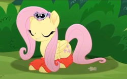 Size: 2160x1344 | Tagged: safe, derpibooru import, screencap, fluttershy, pegasus, pony, spider, rainbow roadtrip, big eyes, bush, clothes, cropped, cute, eyes closed, female, flower, folded wings, happy, hope hollow, lying down, mare, prone, socks, wings