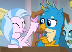 Size: 2160x1550 | Tagged: safe, derpibooru import, screencap, gallus, ocellus, silverstream, changeling, griffon, hippogriff, a rockhoof and a hard place, bookshelf, classroom, cute, desk, excited, eyes closed, female, happy, male, school