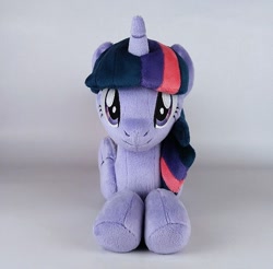 Size: 720x708 | Tagged: safe, derpibooru import, twilight sparkle, twilight sparkle (alicorn), alicorn, pony, looking at you, lying down, merchandise, plushie, prone, smiling, solo, sploot