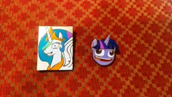 Size: 4000x2250 | Tagged: safe, artist:fluffyorbiter, derpibooru import, princess celestia, twilight sparkle, badge, faic, merchandise, pins, princess molestia, pudding face