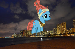 Size: 2047x1356 | Tagged: safe, derpibooru import, edit, editor:jaredking779, meadowbrook, earth pony, pony, female, giant pony, giant/macro earth pony, giantess, hawaii, highrise ponies, honolulu, irl, macro, mare, mega giant, photo, ponies in real life, smiling, solo