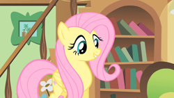 Size: 1280x720 | Tagged: safe, derpibooru import, screencap, fluttershy, pegasus, a bird in the hoof, bookshelf, cute, shyabetes, smiling, solo, staircase, stairs