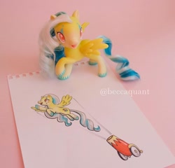 Size: 1080x1036 | Tagged: safe, artist:beccaintoyland, derpibooru import, oc, pegasus, pony, g4, g4.5, cannon, circus, clown, copic, curly hair, curly mane, customized toy, drawing, facial markings, irl, party cannon, photo, red eyes, solo, toy, traditional art, unnamed oc