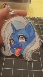 Size: 1152x2048 | Tagged: safe, artist:inkkeystudios, derpibooru import, trixie, pony, unicorn, :3, ahegao, badge, bust, female, heart, heart eyes, open mouth, open smile, photo, portrait, smiling, solo, solo female, tongue, tongue out, traditional art, wingding eyes