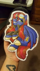 Size: 2988x5312 | Tagged: safe, artist:inkkeystudios, derpibooru import, oc, oc only, pegasus, pony, badge, clothes, goggles, goggles on head, grin, jacket, lidded eyes, looking at you, photo, smiling, solo, spread wings, traditional art, underhoof, unshorn fetlocks, wings