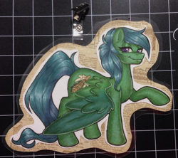 Size: 1030x915 | Tagged: safe, artist:inkkeystudios, derpibooru import, oc, oc only, pony, badge, lidded eyes, looking at you, photo, smiling, solo, spread wings, traditional art, wings