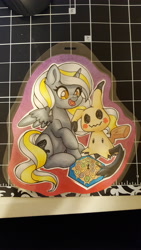 Size: 2988x5312 | Tagged: safe, artist:inkkeystudios, derpibooru import, alicorn, pony, badge, board game, mimikyu, open mouth, open smile, photo, pokémon, smiling, spread wings, traditional art, wings