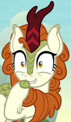 Size: 613x1053 | Tagged: safe, derpibooru import, screencap, autumn blaze, kirin, season 8, sounds of silence, spoiler:s08, biting, cropped, female, hoof biting, smiling, solo