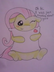 Size: 480x640 | Tagged: safe, artist:fluttersdoodles, derpibooru import, fluttershy, blushing, hug, one eye closed, pillow, pillow hug, sitting, talking to viewer, traditional art, wink