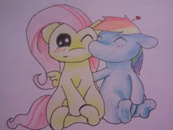 Size: 640x480 | Tagged: safe, artist:fluttersdoodles, derpibooru import, fluttershy, rainbow dash, blushing, eyes closed, female, flutterdash, folded wings, kiss on the cheek, kissing, lesbian, one eye closed, open mouth, shipping, sitting, surprised, traditional art, wings, wink