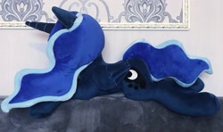 Size: 2048x1213 | Tagged: safe, artist:mdcraft10, derpibooru import, princess luna, alicorn, pony, female, folded wings, horn, irl, lying down, mare, photo, plushie, prone, safe. solo, wings