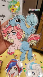 Size: 2988x5312 | Tagged: safe, artist:inkkeystudios, derpibooru import, oc, oc only, earth pony, fish, pony, ahegao, badge, frown, looking at you, open mouth, photo, smiling, solo focus, tongue, tongue out, traditional art, unamused