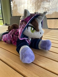 Size: 3024x4032 | Tagged: safe, artist:4everlovedcreationco, derpibooru import, pony, unicorn, colored hooves, disguise, disguised siren, hood, hood up, horn, irl, kellin quinn, lying down, male, onesie, photo, plushie, ponified, prone, sleeping with sirens, slit eyes, solo, species swap, stallion