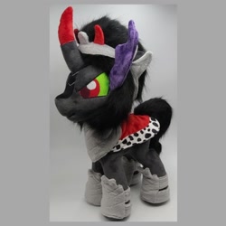 Size: 1080x1080 | Tagged: safe, artist:varonya, derpibooru import, king sombra, pony, unicorn, cape, clothes, crown, curved horn, gray background, horn, irl, jewelry, male, photo, plushie, regalia, simple background, solo, stallion, standing