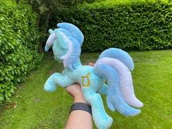 Size: 2048x1536 | Tagged: safe, artist:rtryart, derpibooru import, lyra heartstrings, pony, unicorn, female, happy, horn, irl, lying down, mare, outdoors, photo, plushie, prone, smiling, solo