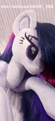 Size: 1890x4096 | Tagged: safe, artist:doctorkoda, derpibooru import, twilight sparkle, twilight sparkle (alicorn), alicorn, pony, commission, female, folded wings, horn, irl, lidded eyes, lying down, mare, photo, plushie, prone, smiling, solo, wings