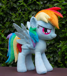 Size: 2775x3153 | Tagged: safe, artist:rtryart, derpibooru import, rainbow dash, pegasus, pony, female, irl, mare, outdoors, photo, plushie, smiling, solo, spread wings, standing, wings