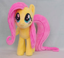 Size: 1243x1113 | Tagged: safe, artist:buttercupbabyppg, derpibooru import, fluttershy, pegasus, pony, cute, female, folded wings, irl, mare, photo, plushie, shyabetes, solo, wings