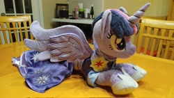 Size: 2048x1152 | Tagged: safe, artist:1stastrastudio, derpibooru import, twilight sparkle, twilight sparkle (alicorn), alicorn, pony, the last problem, clothes, commission, coronation dress, dress, female, hoof shoes, horn, irl, lying down, mare, photo, plushie, prone, second coronation dress, solo, spread wings, wings