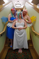 Size: 3744x5616 | Tagged: safe, artist:jimthecactus, derpibooru import, fluttershy, princess celestia, rainbow dash, human, absurd resolution, clothes, cosplay, costume, dress, female, hands together, irl, looking at you, photo, pony ears, stairs, trio