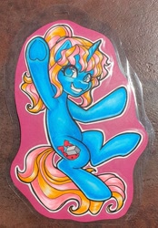 Size: 2108x3032 | Tagged: safe, artist:inkkeystudios, derpibooru import, pony, unicorn, badge, eye clipping through hair, grin, looking at you, photo, smiling, solo, traditional art, underhoof