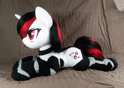 Size: 3588x2536 | Tagged: safe, artist:doctorkoda, derpibooru import, oc, oc only, oc:blackjack, unicorn, fallout equestria, fallout equestria: project horizons, bell, colalr, female, horn, irl, lying down, photo, plushie, prone, solo