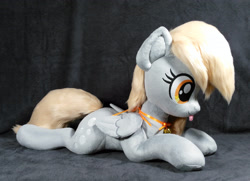 Size: 3048x2212 | Tagged: safe, artist:doctorkoda, derpibooru import, derpy hooves, pegasus, pony, :p, female, folded wings, irl, lying down, mare, photo, plushie, prone, solo, tongue, tongue out, wings