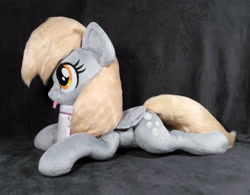 Size: 3476x2708 | Tagged: safe, artist:doctorkoda, derpibooru import, derpy hooves, pegasus, pony, :p, female, folded wings, irl, lying down, mare, photo, plushie, prone, solo, tongue, tongue out, wings