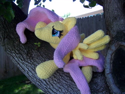 Size: 3264x2448 | Tagged: safe, artist:starfulstitches, derpibooru import, fluttershy, pegasus, pony, female, lying down, mare, photo, plushie, prone, solo, spread wings, wings