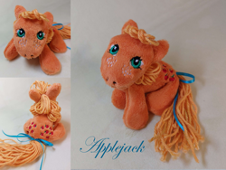 Size: 1280x961 | Tagged: safe, artist:starfulstitches, derpibooru import, applejack (g1), earth pony, pony, g1, female, lying down, mare, photo, plushie, prone, solo