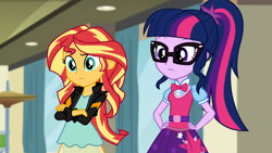 Size: 3072x1727 | Tagged: safe, derpibooru import, screencap, sci-twi, sunset shimmer, twilight sparkle, human, dance magic, equestria girls, spoiler:eqg specials, canterlot high, clothes, crossed arms, duo, duo female, eyebrows, female, glasses, hand on hip, jacket, leather, leather jacket, ponytail, raised eyebrow, sci-twi outfits